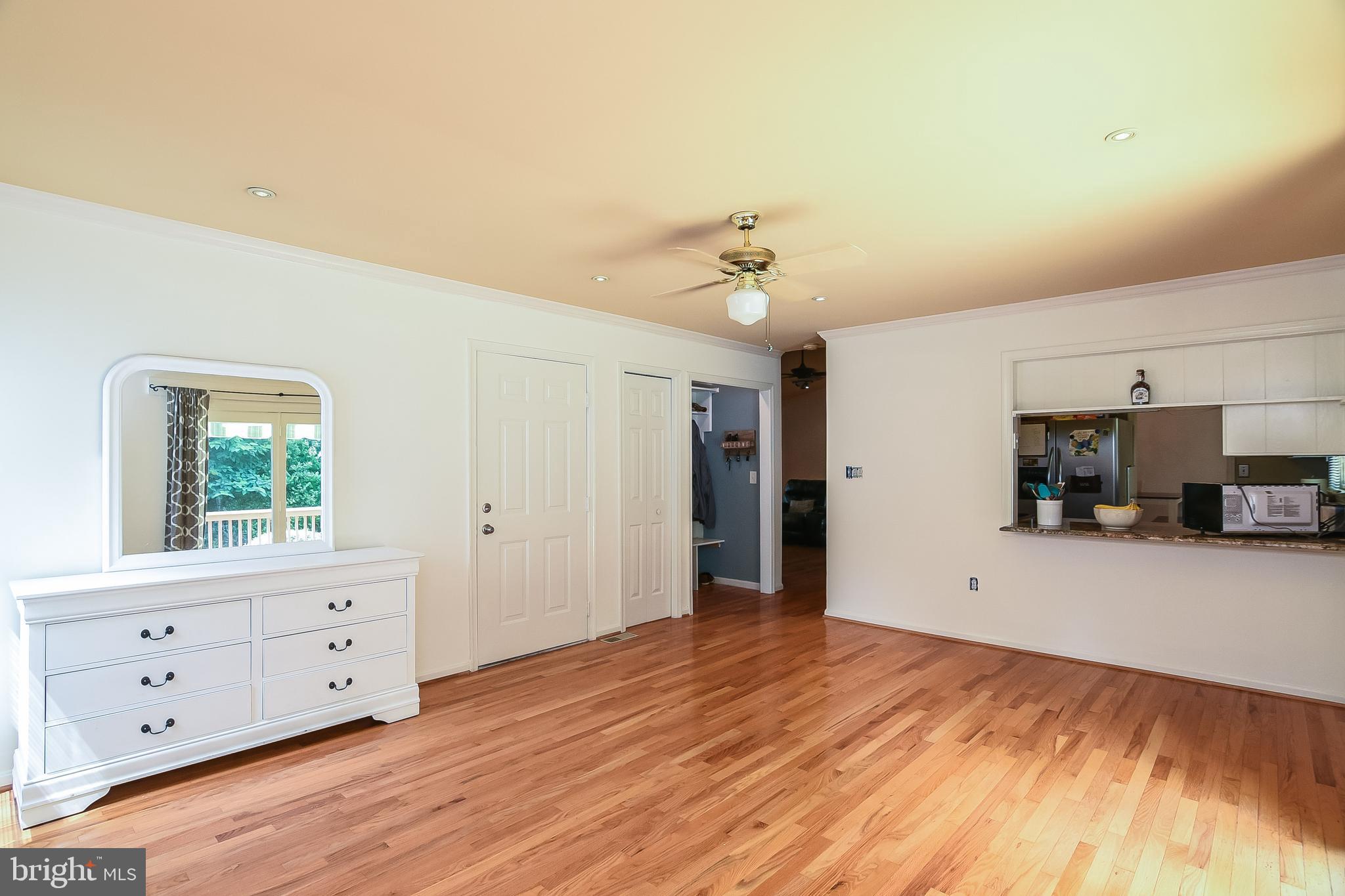 2183 Sebastian Road Fredericksburg, VA 22405 - Photo 13 of 38 Bonus room with view of kitchen into living room.