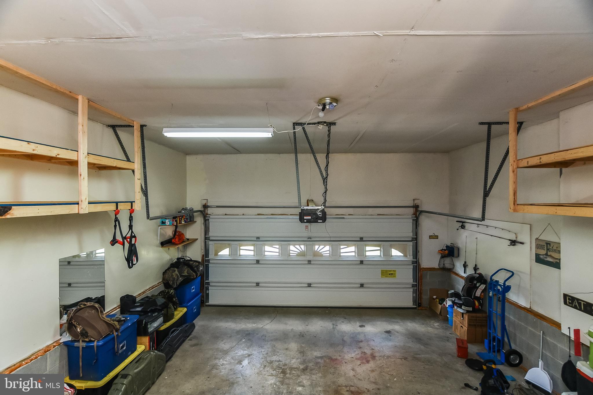 2183 Sebastian Road Fredericksburg, VA 22405 - Photo 35 of 38 Large garage with storage and 11 foot ceiling.