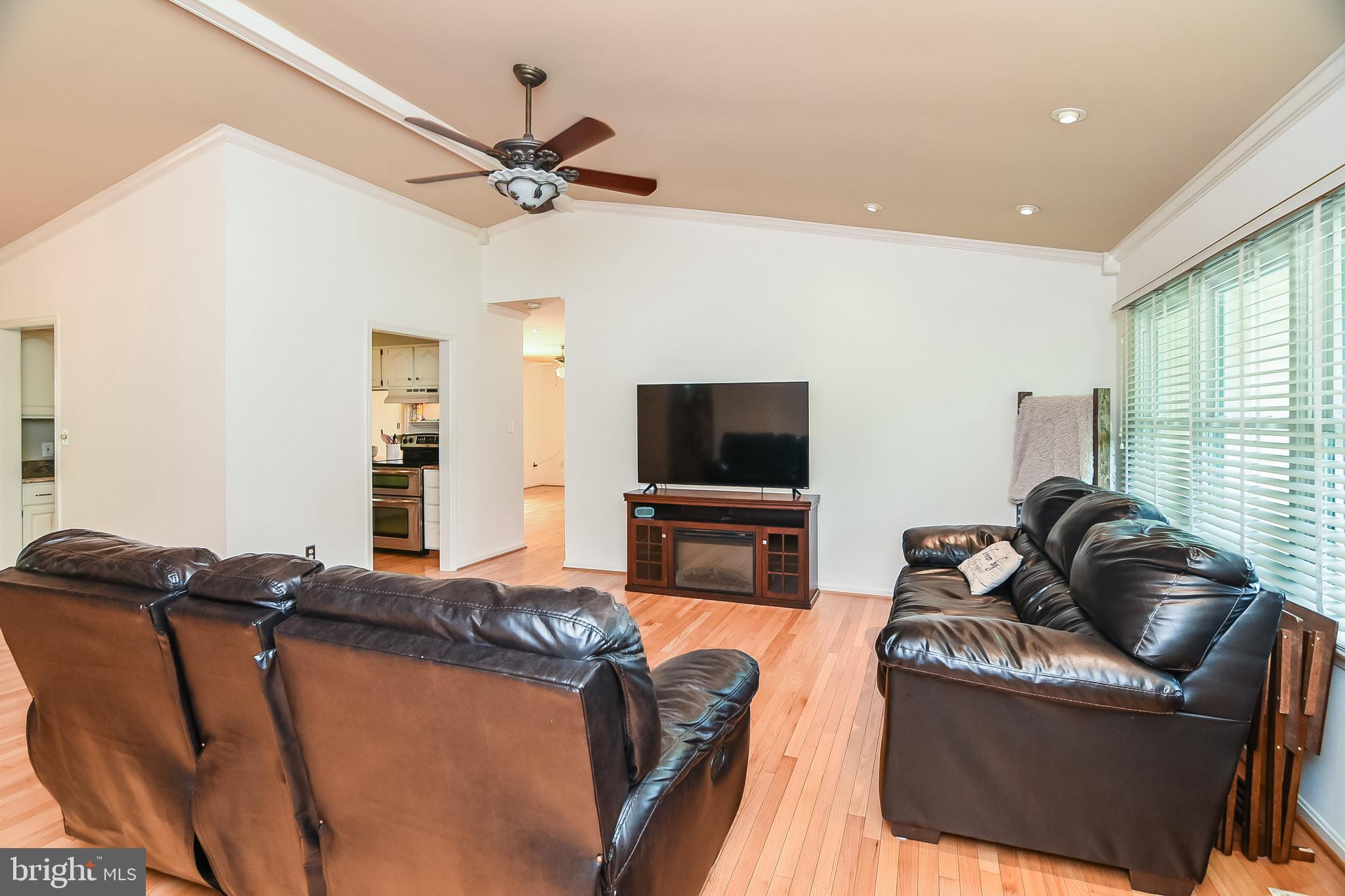 2183 Sebastian Road Fredericksburg, VA 22405 - Photo 7 of 38 Living room with view to kitchen and bonus/family