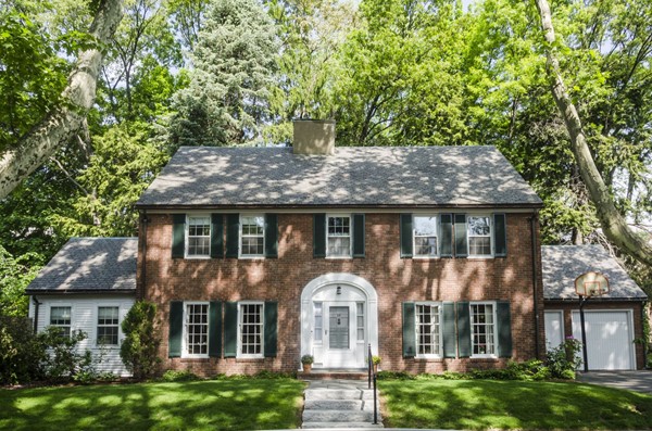 29 Lowell Road Brookline, MA 02445 - Photo 1 of 19 front view of a house with a garden