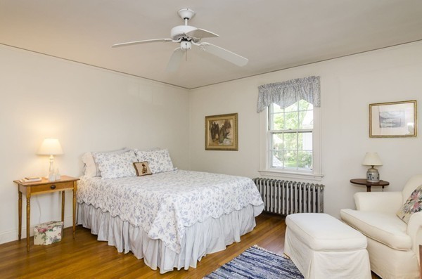 29 Lowell Road Brookline, MA 02445 - Photo 13 of 19 a bedroom with a bed and a window