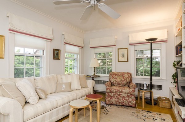 29 Lowell Road Brookline, MA 02445 - Photo 6 of 19 a living room with furniture and a large window