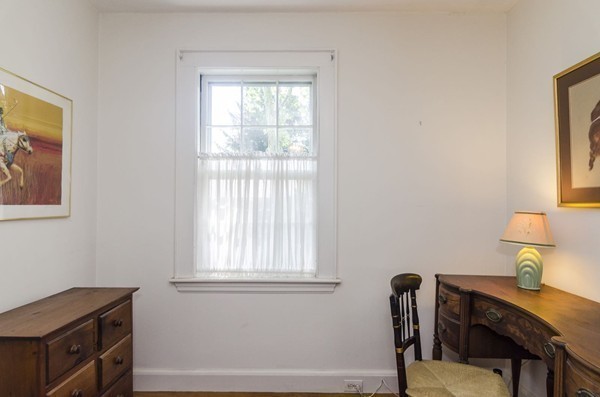 29 Lowell Road Brookline, MA 02445 - Photo 9 of 19 a view of a workspace with furniture and a window