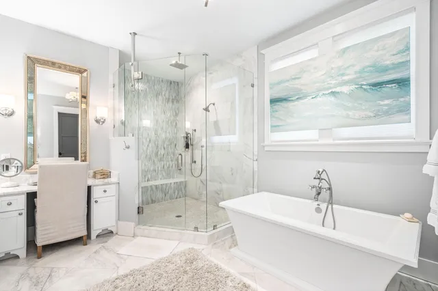 a bathroom with a bathtub and a shower