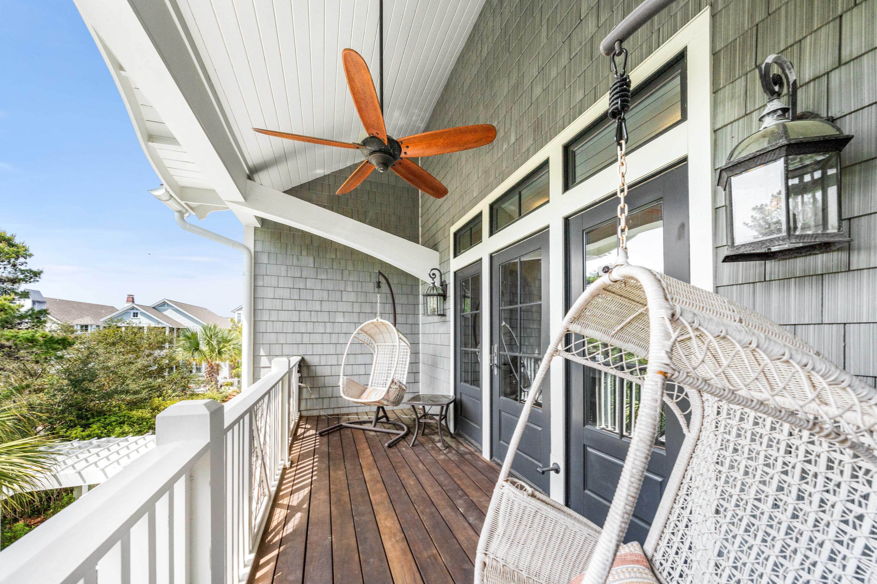 52 North Shingle Way Inlet Beach, FL 32461 - Photo 38 of 77 a view of balcony with wooden floor and outdoor seating