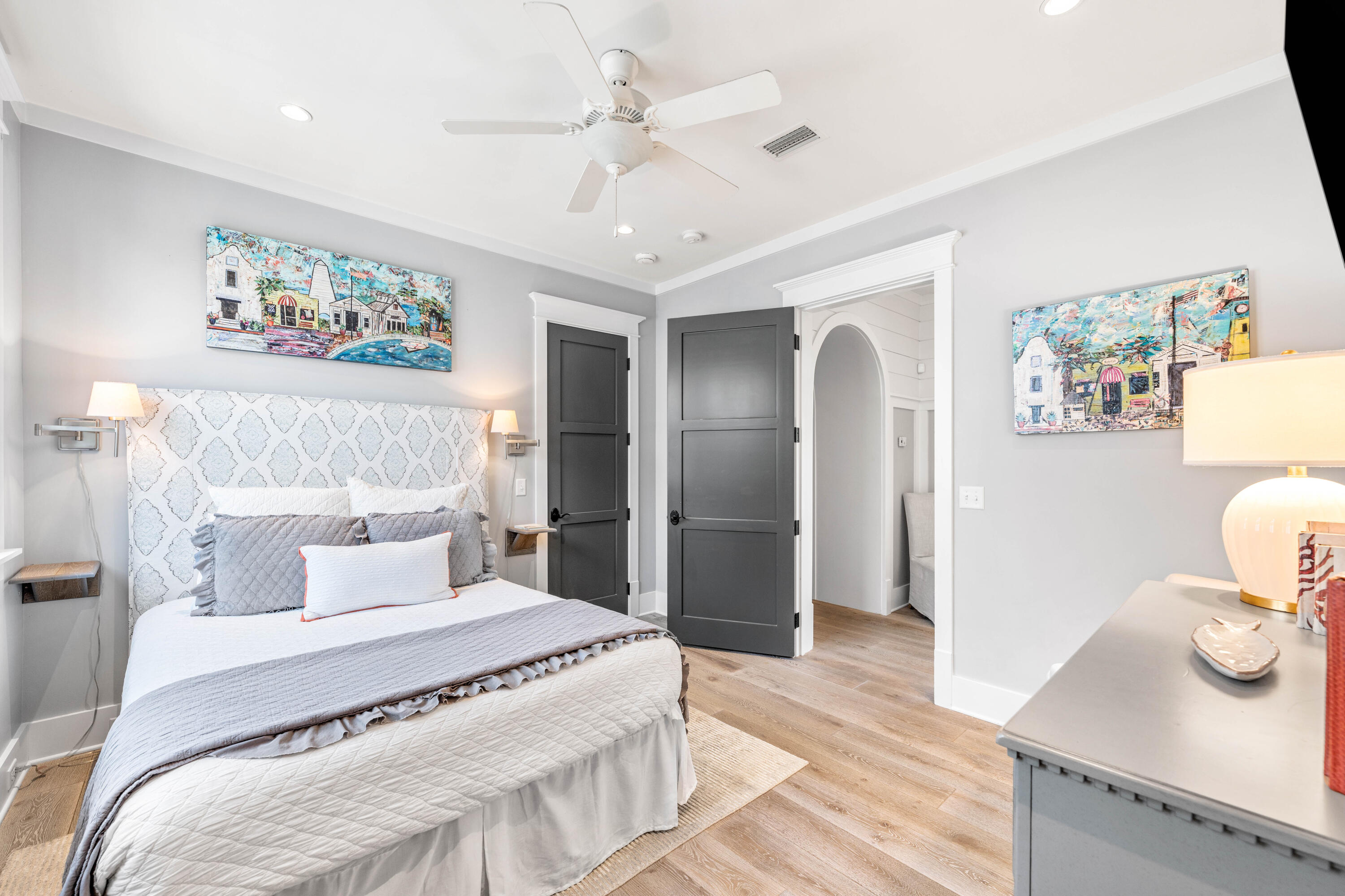 52 North Shingle Way Inlet Beach, FL 32461 - Photo 45 of 77 a bedroom with a large bed and a chandelier