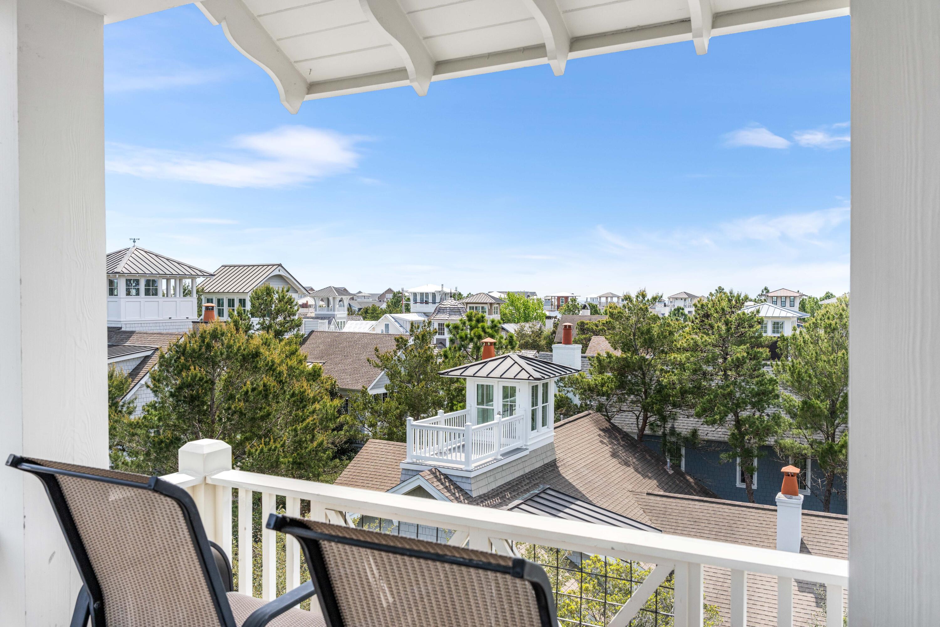 52 North Shingle Way Inlet Beach, FL 32461 - Photo 57 of 77 a view of a balcony with two chairs and a table