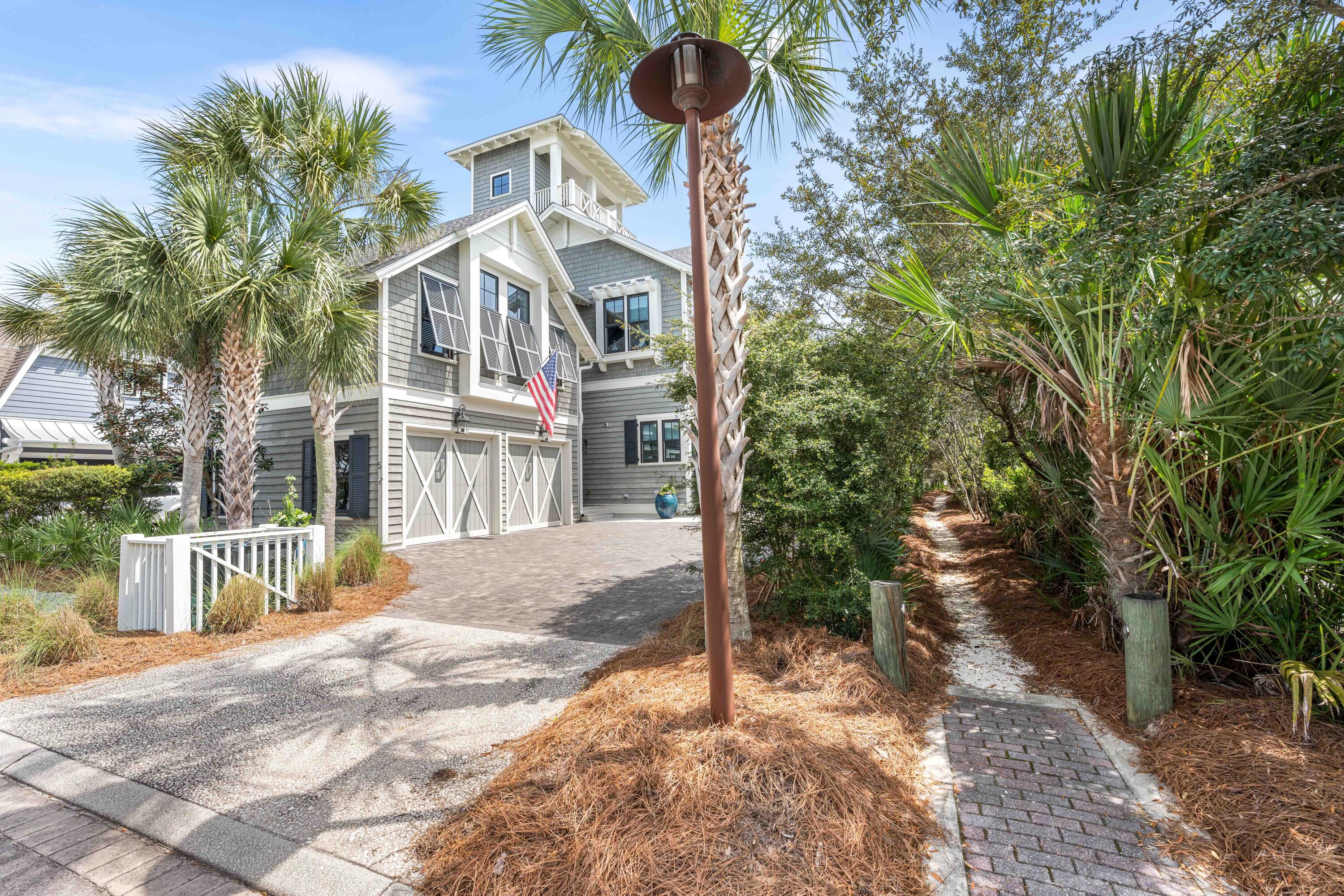 52 North Shingle Way Inlet Beach, FL 32461 - Photo 70 of 77 a view of a house with a yard and plants
