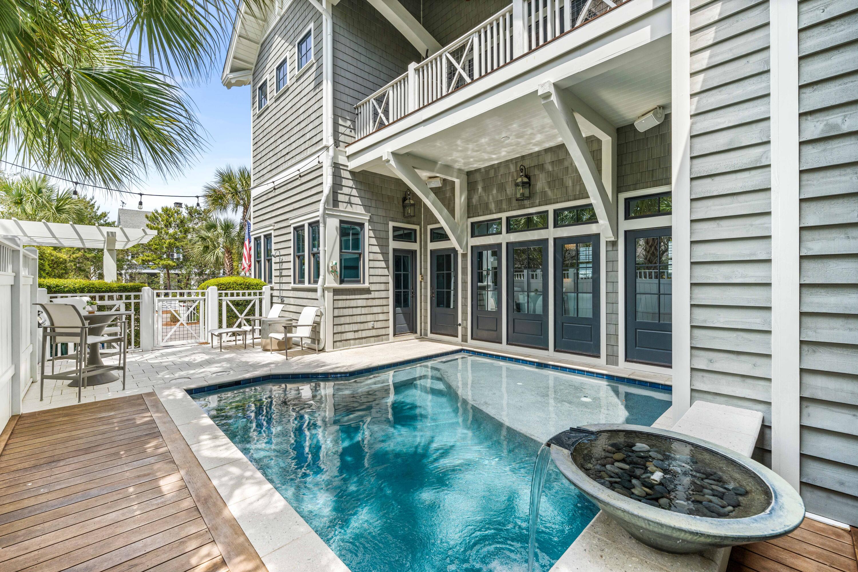52 North Shingle Way Inlet Beach, FL 32461 - Photo 7 of 77 a view of a house with backyard and sitting area