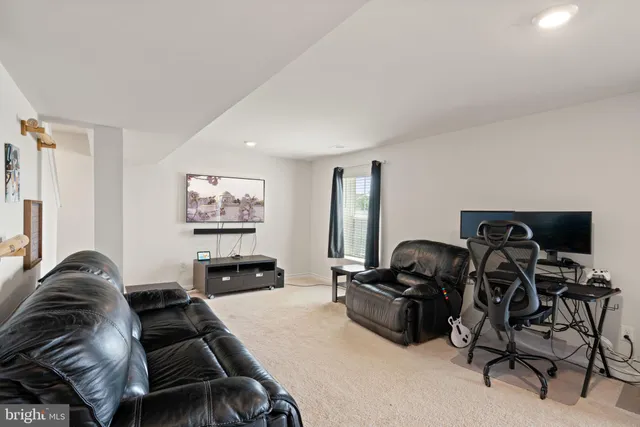 a view of a workspace with furniture