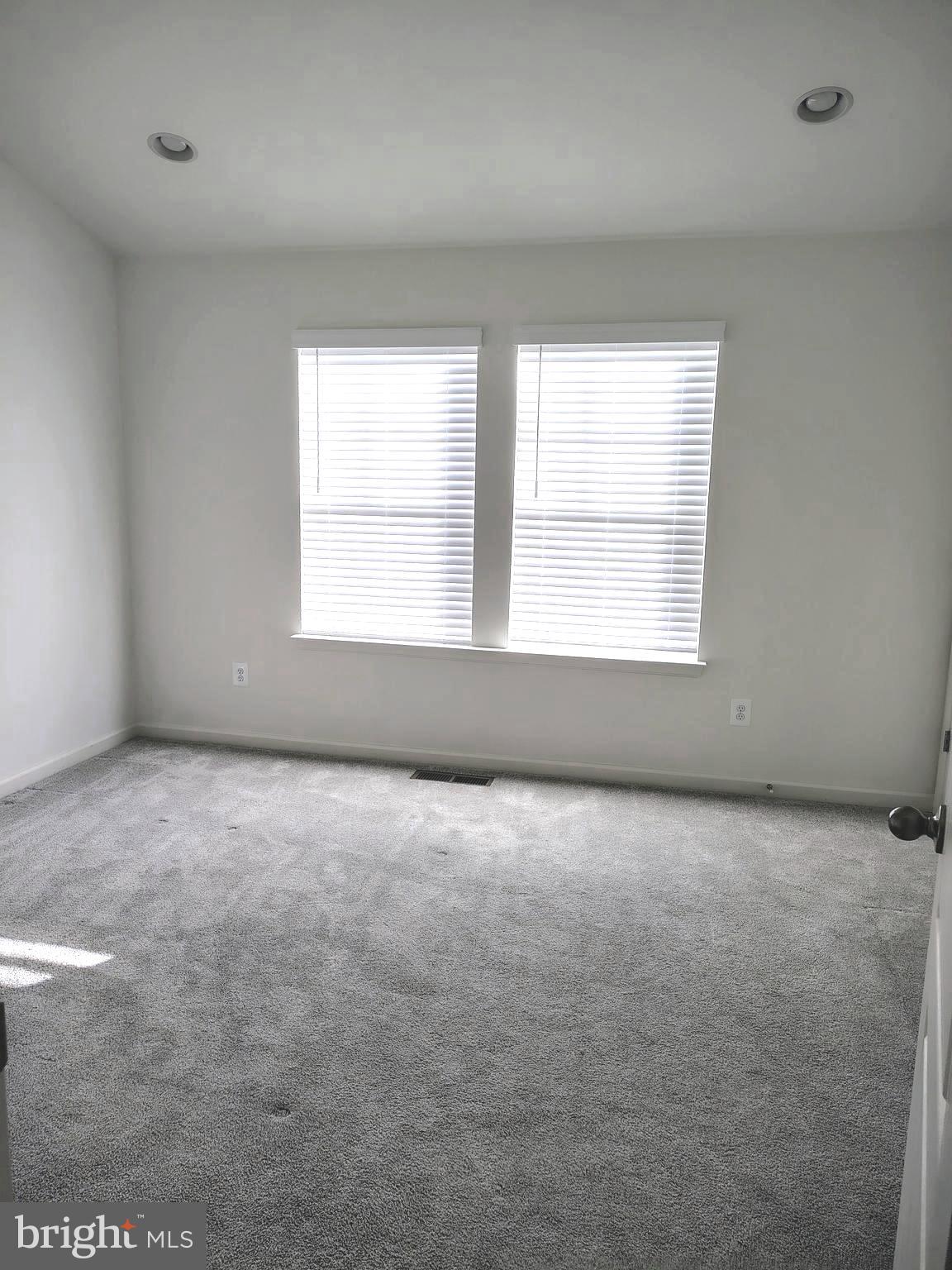 136 Tuxford Road Falling Waters, WV 25419 - Photo 17 of 27 an empty room with a window