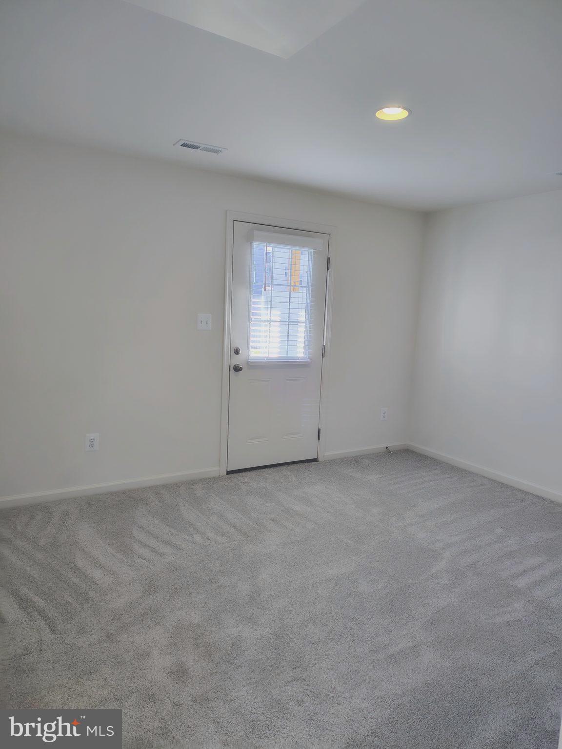136 Tuxford Road Falling Waters, WV 25419 - Photo 25 of 27 an empty room with a window