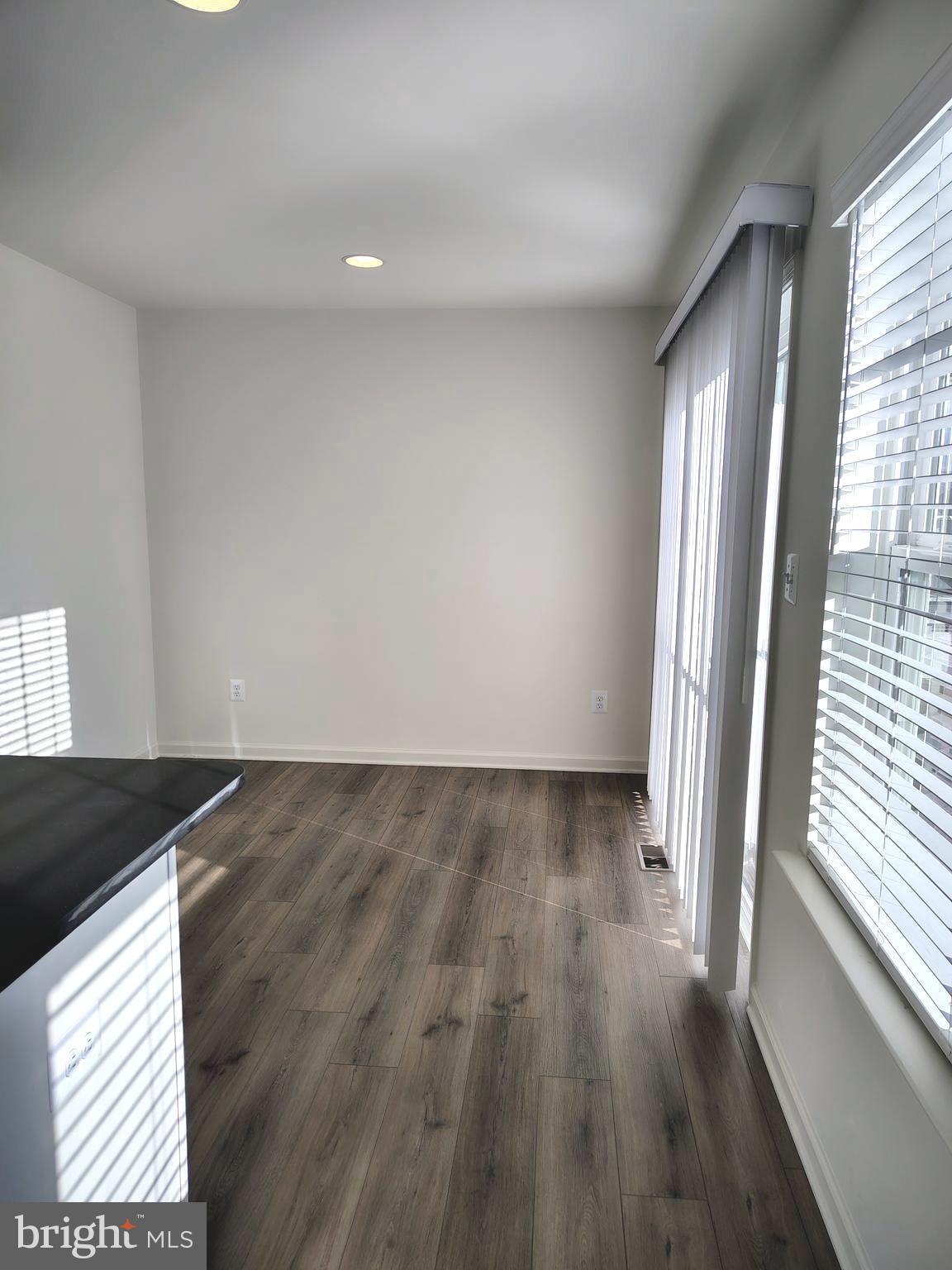136 Tuxford Road Falling Waters, WV 25419 - Photo 9 of 27 a view of a livingroom with wooden floor and window