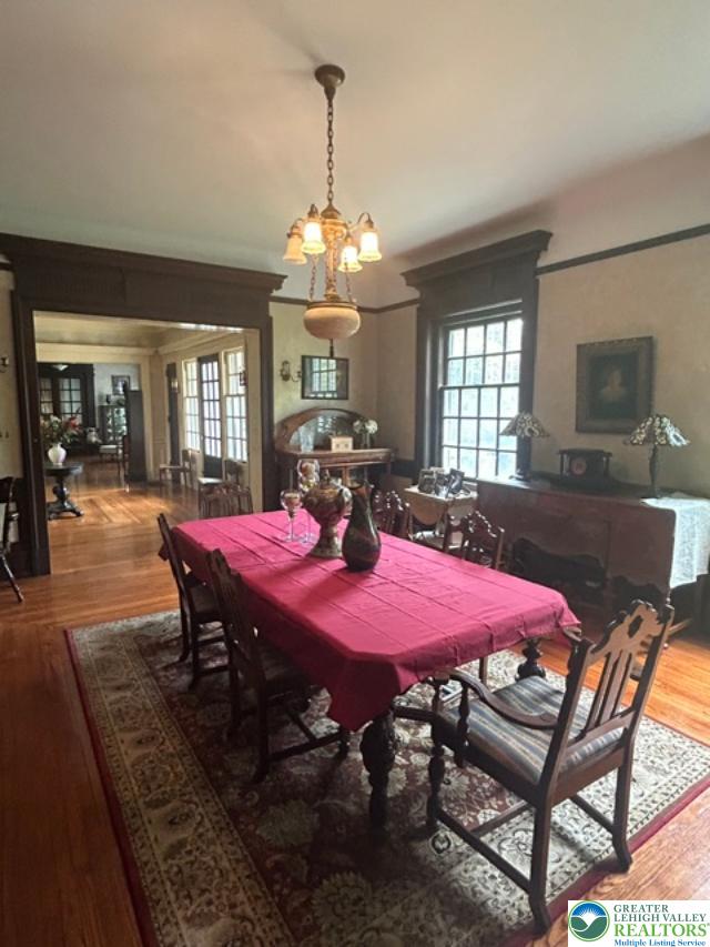 1170 Mosser Road Breinigsville, PA 18031 - Photo 12 of 19 Rich hardwood floors complement detailed trim work in this stately dining room.