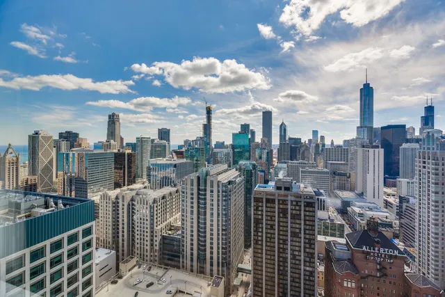 a view of a city with tall buildings