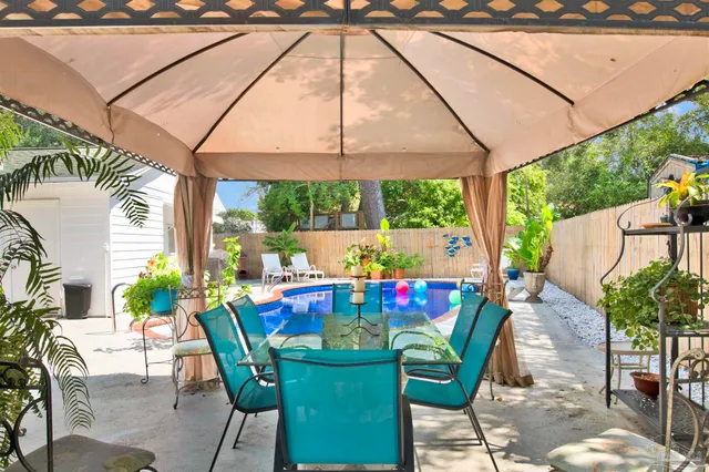 a view of outdoor dining space with a patio