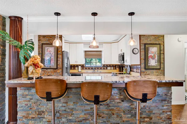 a dining table chairs and a table with chairs