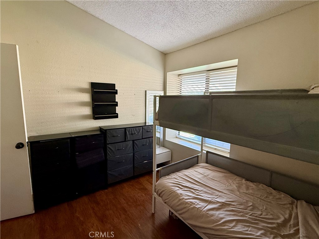 377 Quandt Ranch Road San Jacinto, CA 92583 - Photo 29 of 37 a room with a bed and a television
