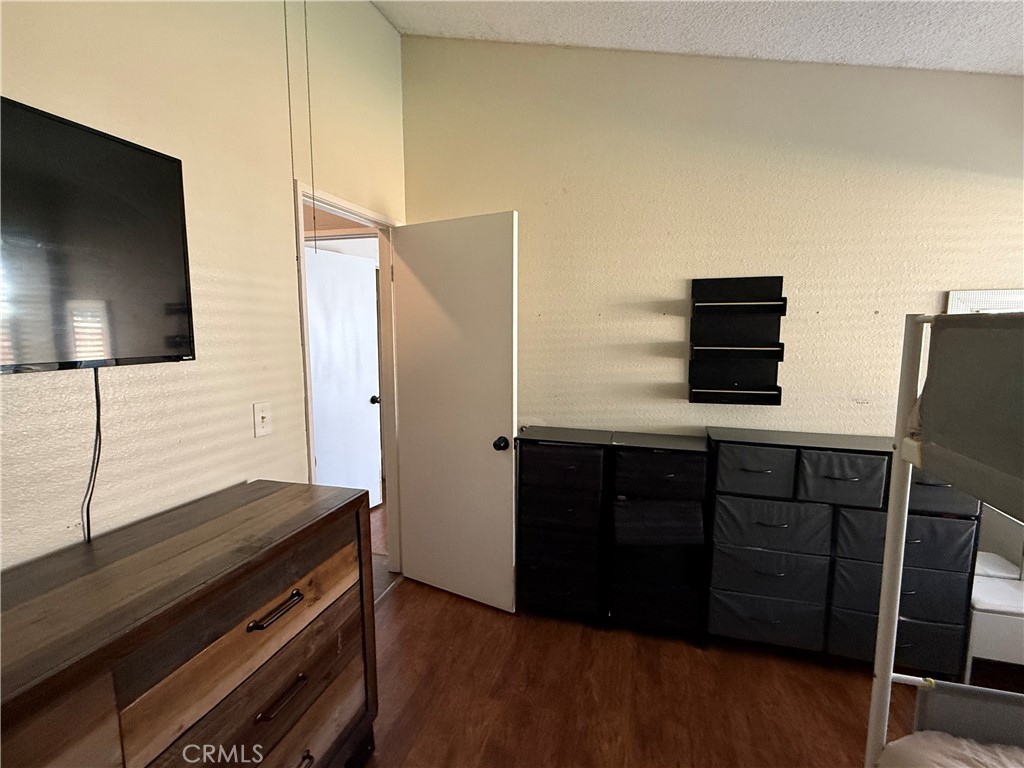 377 Quandt Ranch Road San Jacinto, CA 92583 - Photo 30 of 37 a kitchen with a refrigerator and a stove top oven