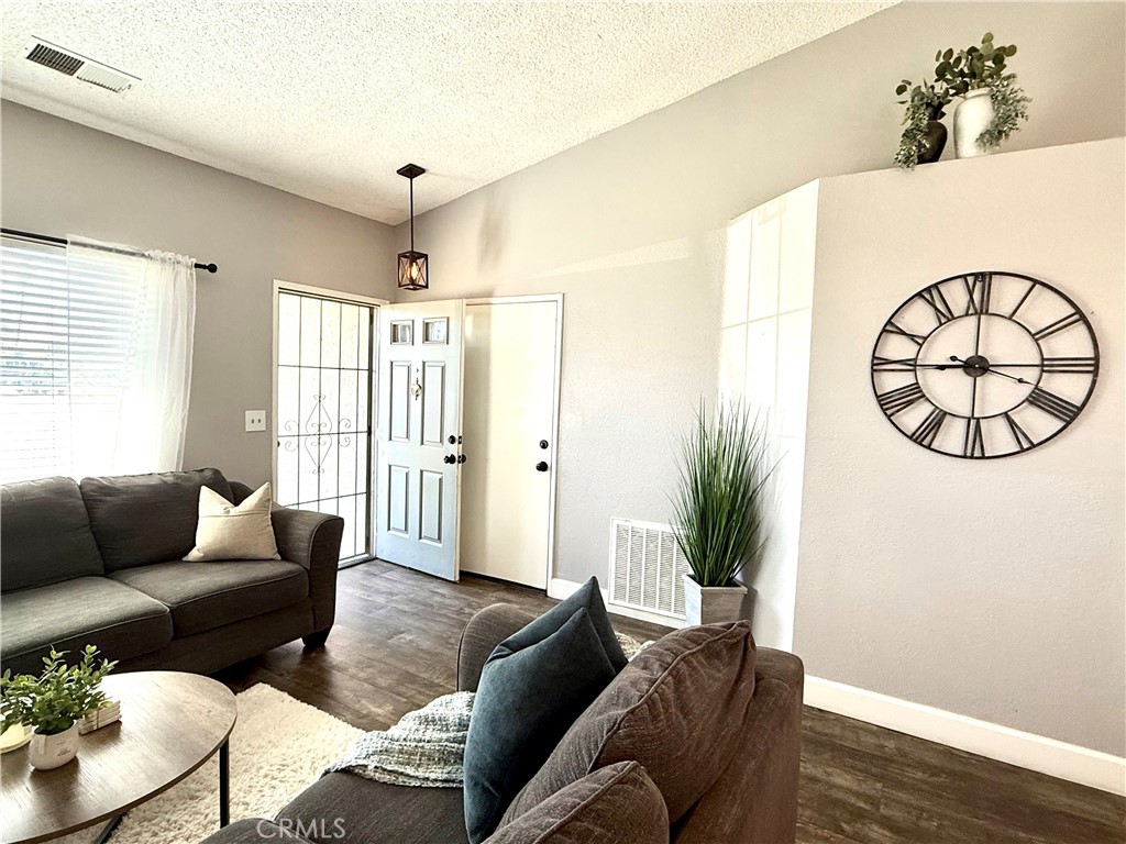 377 Quandt Ranch Road San Jacinto, CA 92583 - Photo 5 of 37 a living room with furniture and a window