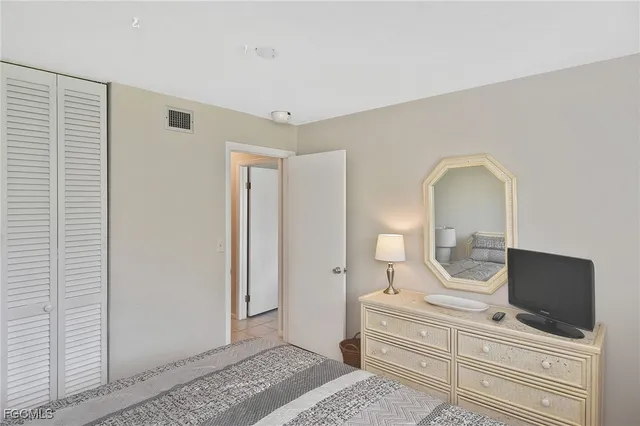a view of living room with furniture and flat screen tv