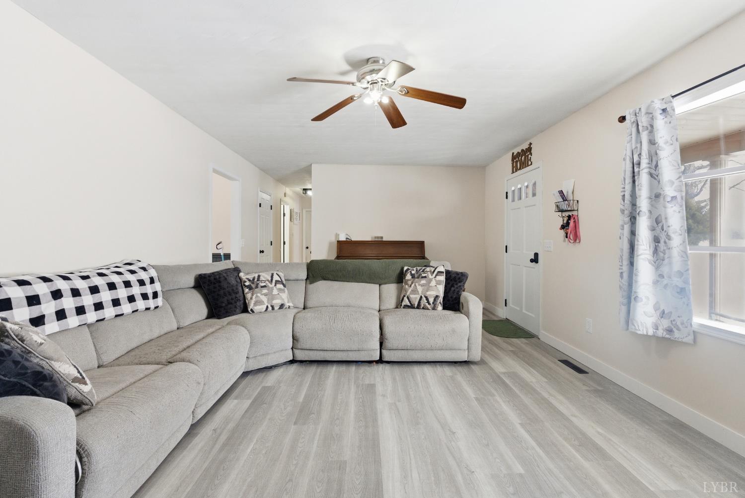 5225 Blue Ridge Drive Gretna, VA 24557 - Photo 7 of 28 a living room with furniture and white walls