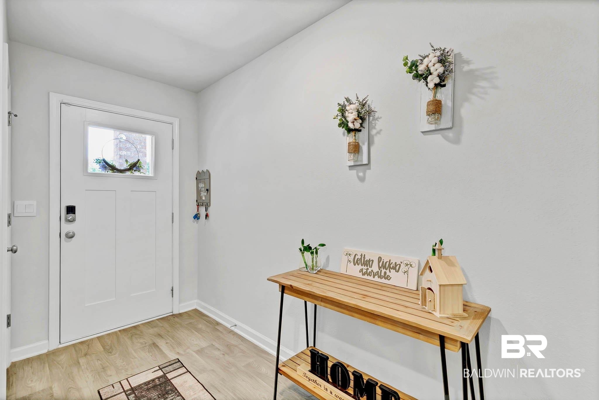 17217 REFLECTION Street Loxley, AL 36551 - Photo 5 of 83 Foyer entrance with light wood finished floors and baseboards