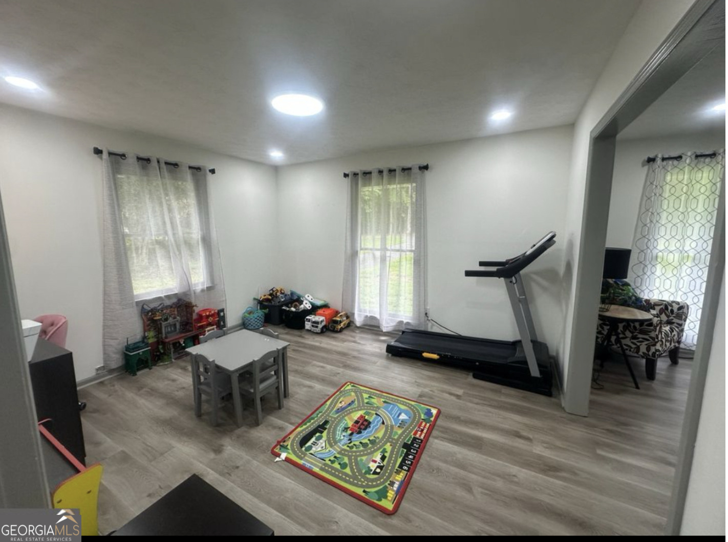 2775 Jackson Road Griffin, GA 30223 - Photo 11 of 30 a living room with furniture and a wooden floor