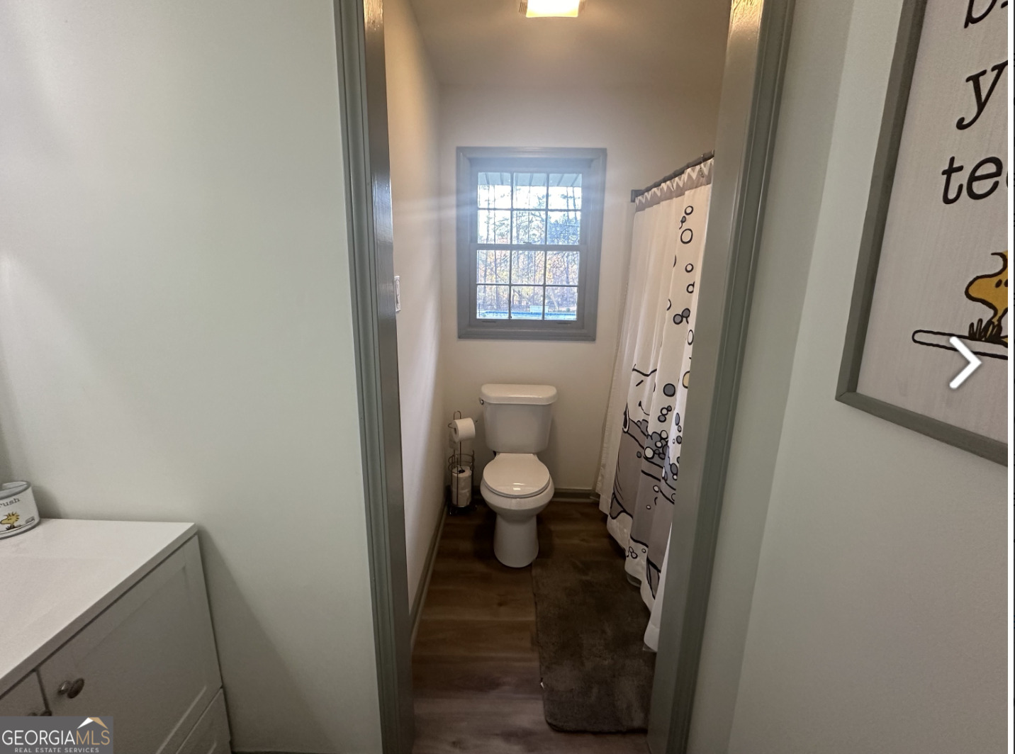 2775 Jackson Road Griffin, GA 30223 - Photo 16 of 30 a bathroom with a toilet and a shower