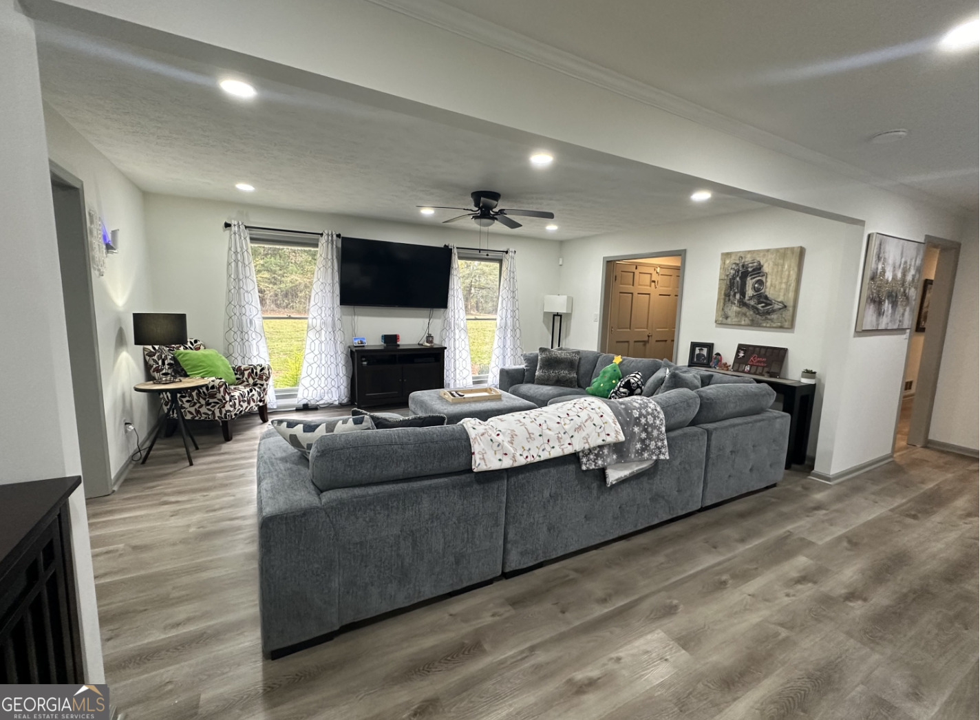 2775 Jackson Road Griffin, GA 30223 - Photo 5 of 30 a living room with furniture and a flat screen tv