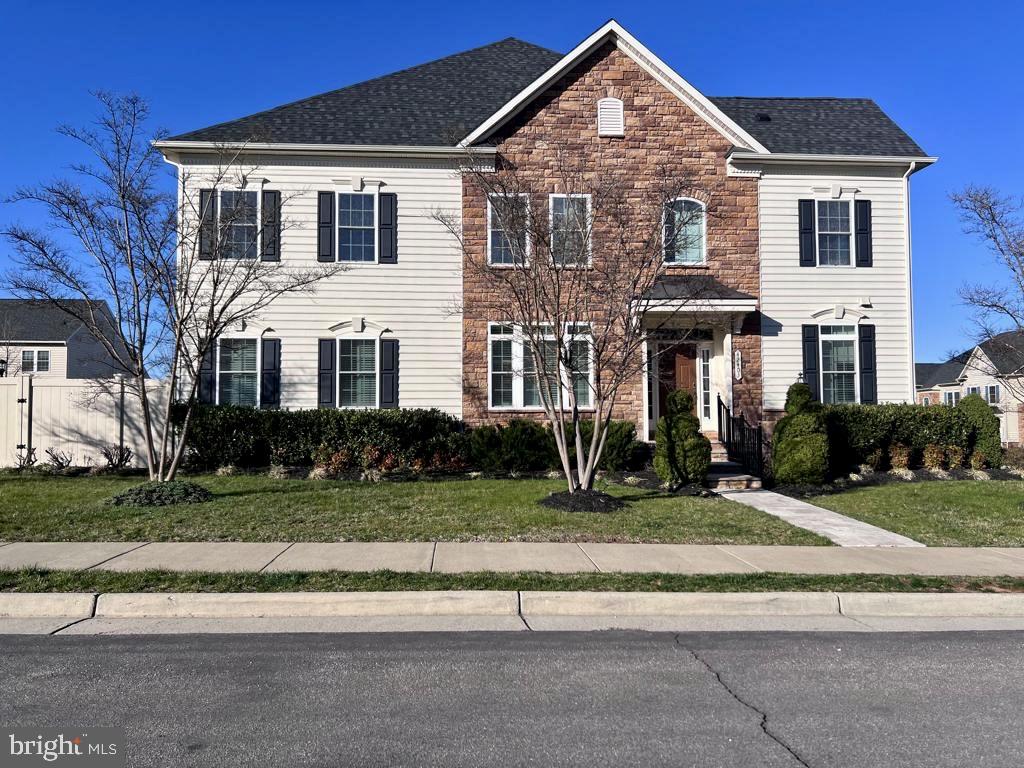 42403 Pine Forest Drive Chantilly, VA 20152 - Photo 1 of 37 a front view of a house with a yard