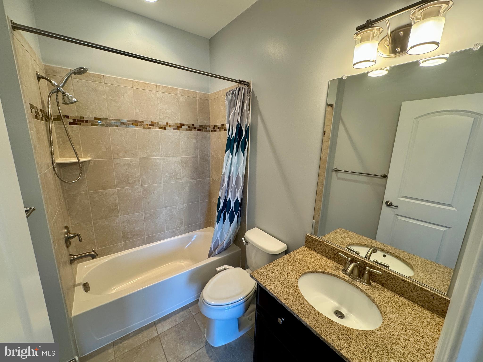 42403 Pine Forest Drive Chantilly, VA 20152 - Photo 20 of 37 a bathroom with a sink toilet and shower