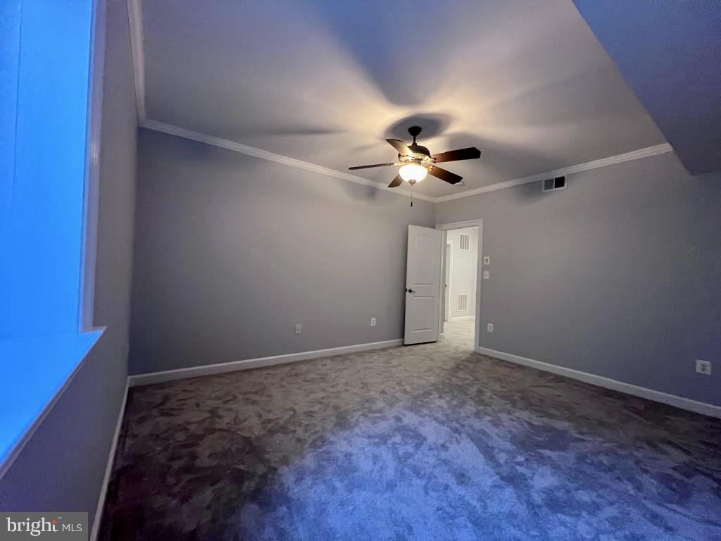 42403 Pine Forest Drive Chantilly, VA 20152 - Photo 31 of 37 a view of a livingroom with a chandelier fan
