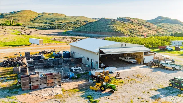 an outdoor space with furniture and mountain view
