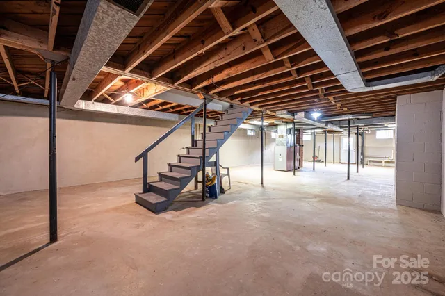 a view of a room with wooden roof