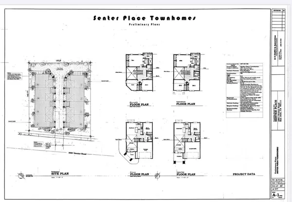 an aerial view of parking and yard