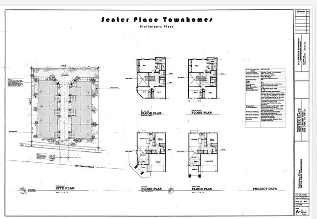 an aerial view of parking and yard