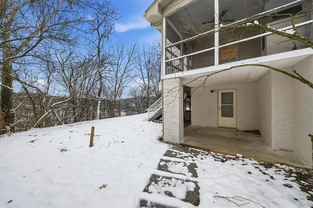 a view of a house with a snow