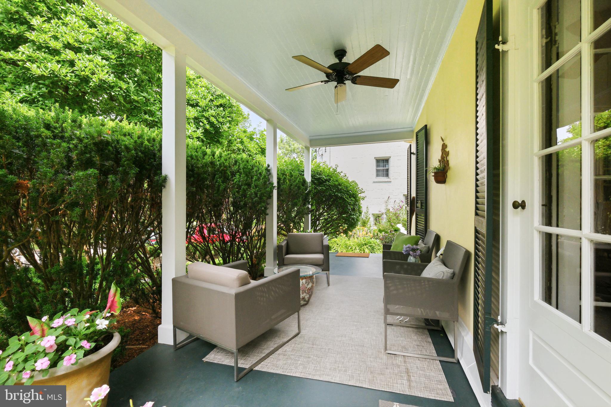 6411 33rd Street Northwest Washington, DC 20015 - Photo 44 of 48 a living room with patio furniture and garden view