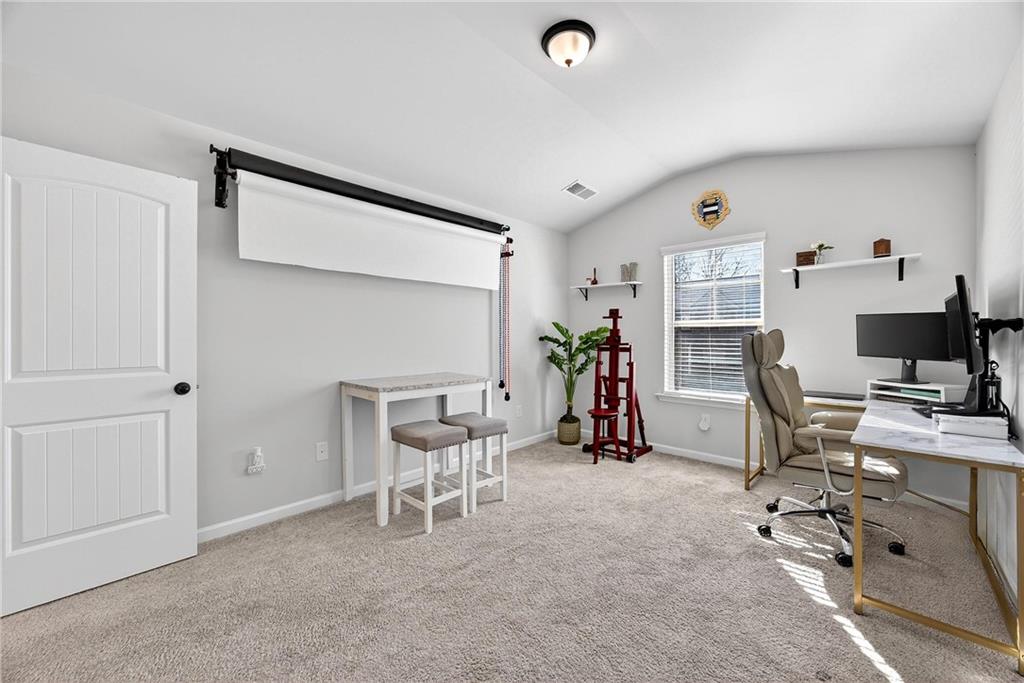 4827 Sultana Way Atlanta, GA 30331 - Photo 21 of 24 a view of a workspace with furniture and a window