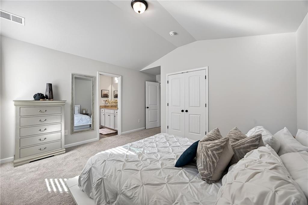 4827 Sultana Way Atlanta, GA 30331 - Photo 23 of 24 a bedroom with a bed and a dresser
