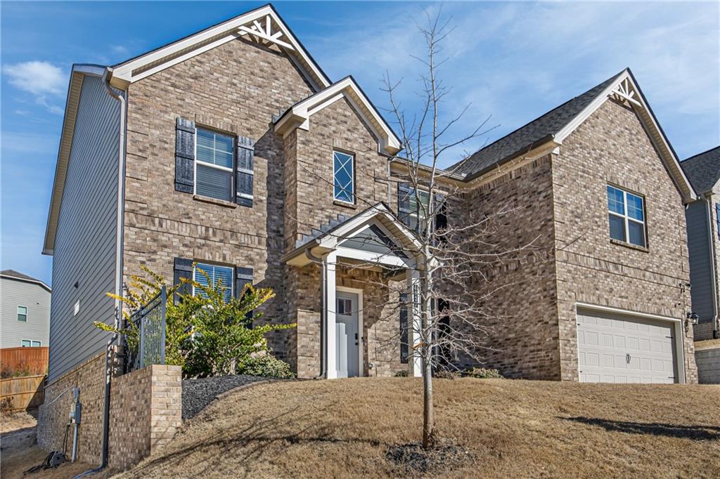 4827 Sultana Way Atlanta, GA 30331 - Photo 24 of 24 a front view of a house with garden