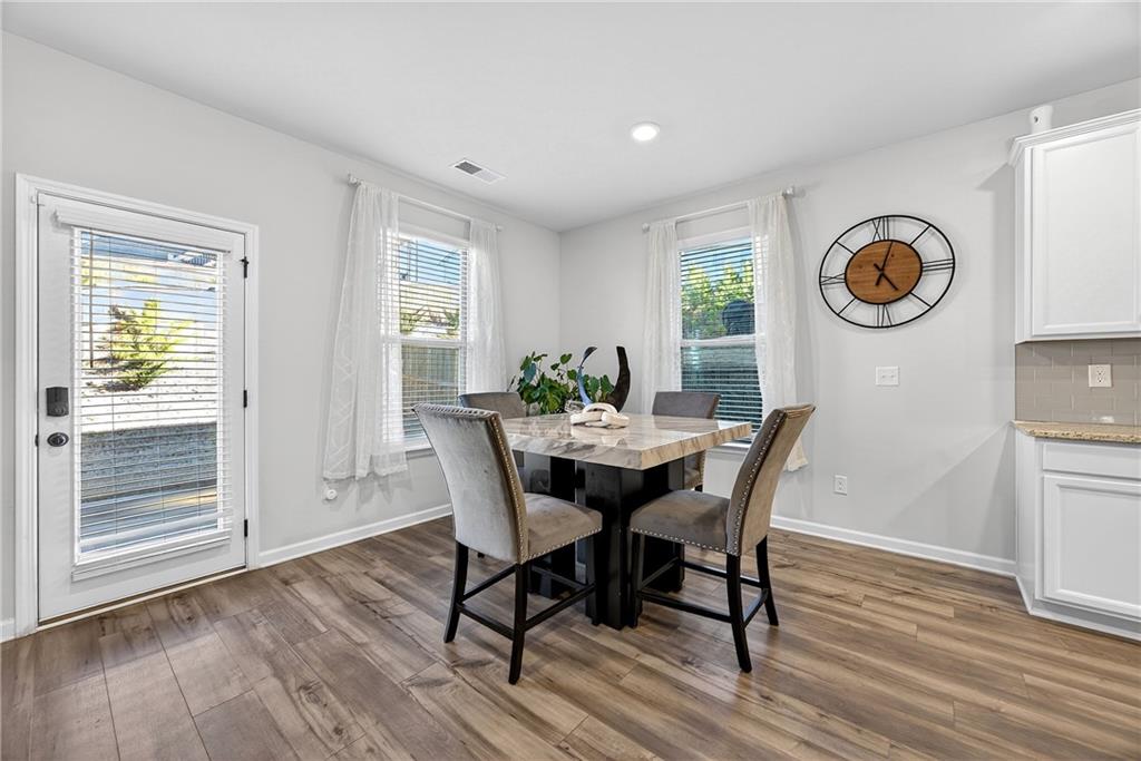 4827 Sultana Way Atlanta, GA 30331 - Photo 5 of 24 a view of a dining room with furniture window and wooden floor