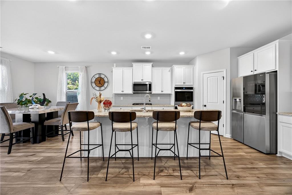 4827 Sultana Way Atlanta, GA 30331 - Photo 6 of 24 a view of a dining area with furniture