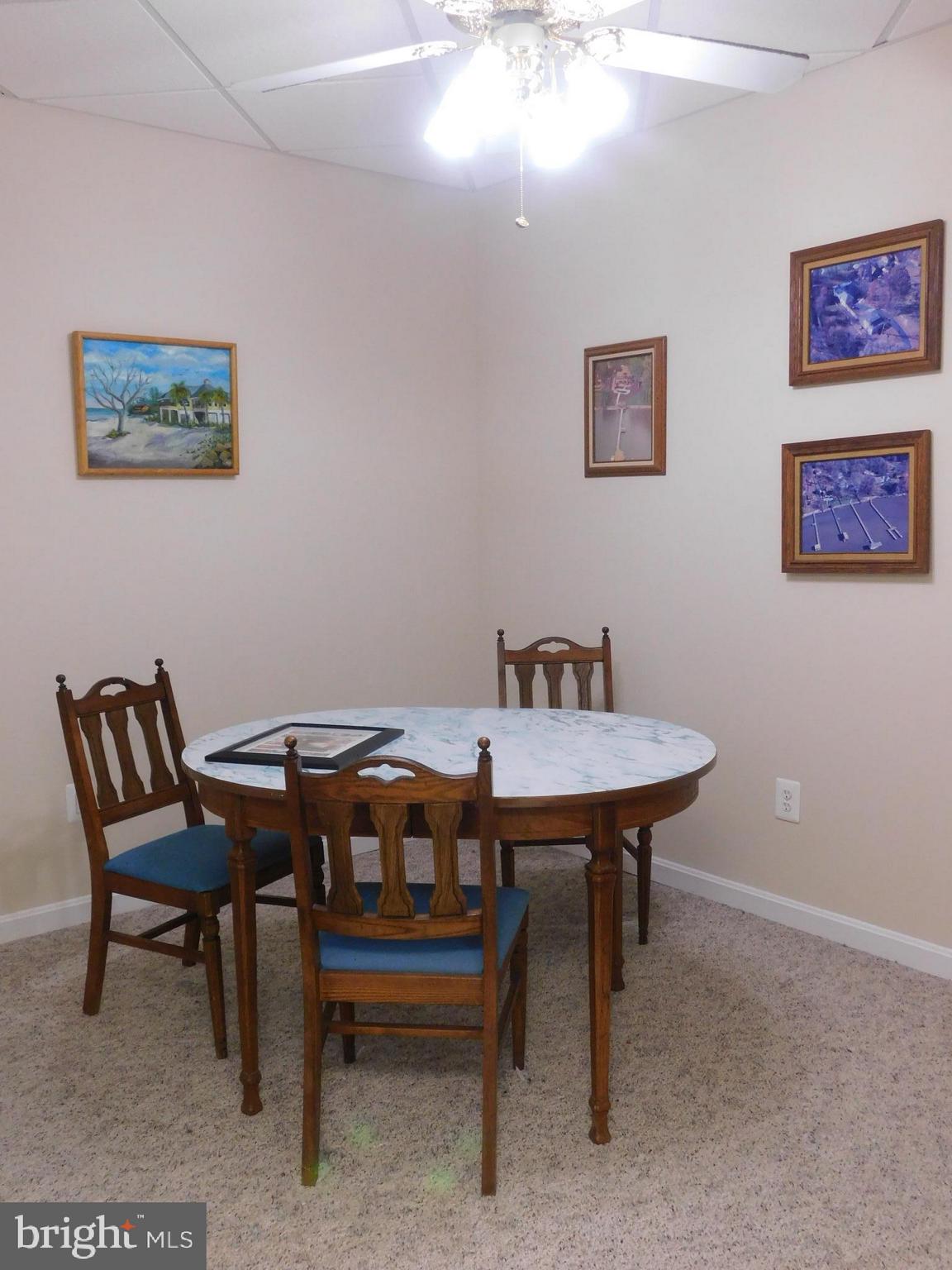 3239 Holland Cliffs Road Huntingtown, MD 20639 - Photo 9 of 13 Basement Dining Area