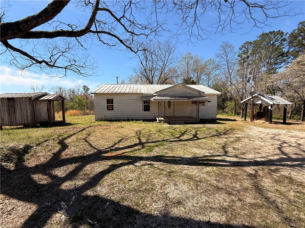 140 Davis Hill Road West Union, SC 29696 - Photo 1 of 12 This quaint residence features a charming front porch, set on a spacious lot with mature trees.