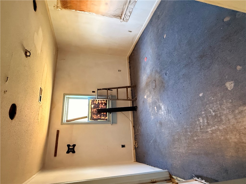 140 Davis Hill Road West Union, SC 29696 - Photo 7 of 12 This interior space offers abundant natural light, providing a bright and airy atmosphere.