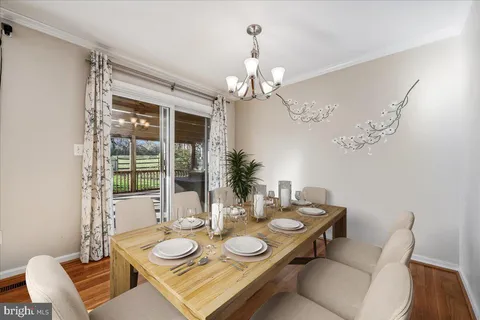 a kitchen with stainless steel appliances granite countertop a stove and cabinets