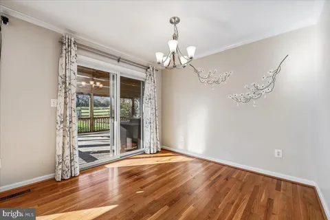 a view of a room with a large window