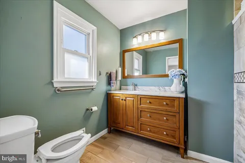 a view of an empty room with gym equipment